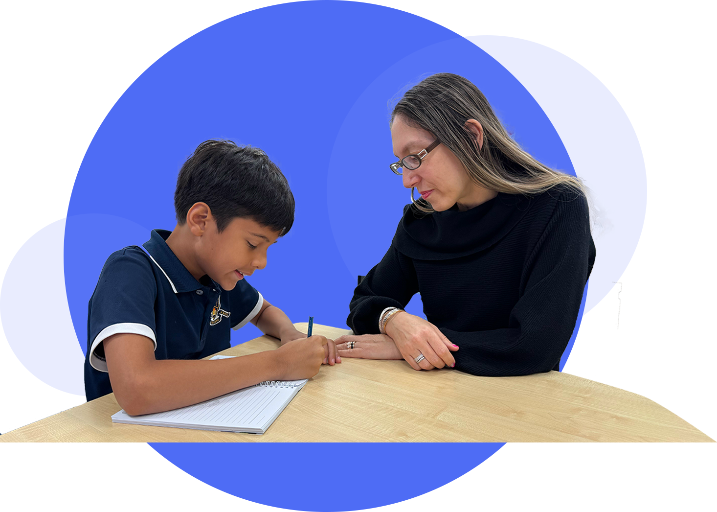 Child working on learning activities with an educational therapist